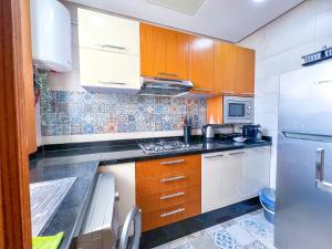 Køkken eller tekøkken på Downtown Gem - Central Rabat apartment in a 1910 Building