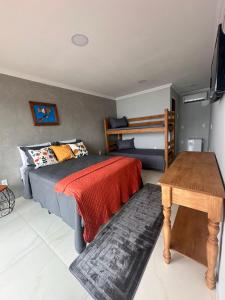 Postel nebo postele na pokoji v ubytování Recanto do Leste
