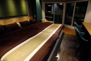 Fotografie z fotogalerie ubytování MolinHotels102-札幌市定山渓天然温泉に紅葉シーズン到来-W-beds2&S-beds3 v destinaci Jozankei