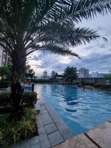 Hồ bơi trong/gần 1BR T2 with Balcony Panoramic View at Horizons 101