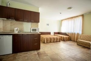 Kuchyň nebo kuchyňský kout v ubytování Family hotel Apolon