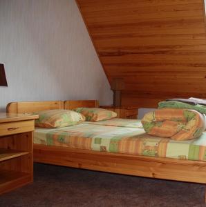 A bed or beds in a room at Zīriņi