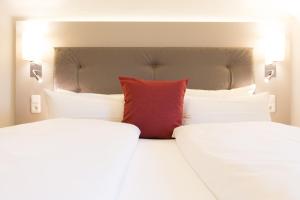 Postel nebo postele na pokoji v ubytování Hermes Hotel Oldenburg
