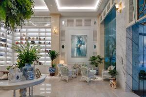 Posezení v ubytování Au Lac Charner Hotel