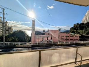 a view of a city from a balcony at Apt熱海 in Atami +14 photos