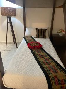 Krevet ili kreveti u jedinici u objektu Hotel Itzae