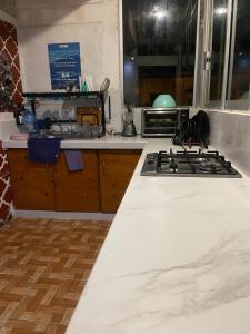Una cocina o cocineta en Hotel Perla Mazatlan
