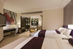 Krevet ili kreveti u jedinici u objektu Gateway Hotel, Marco Polo