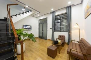 Posezení v ubytování Cỏ Hai Lá Homestay