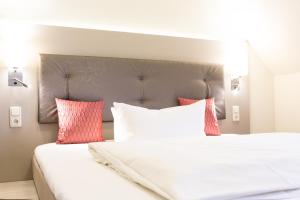 Postel nebo postele na pokoji v ubytování Hermes Hotel Oldenburg