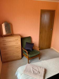 Postelja oz. postelje v sobi nastanitve Foxton Beach Bach 5 Star Location 2 Min Walk To Beach New Furnishings BBQ