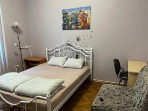 Postel nebo postele na pokoji v ubytování Centrum Hostel