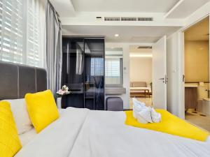 Ένα ή περισσότερα κρεβάτια σε δωμάτιο στο Circle REIN Sukhumvit 12 Bangkok