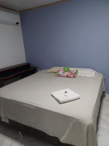 Ένα ή περισσότερα κρεβάτια σε δωμάτιο στο Qroom Janaina +8 φωτογραφίες