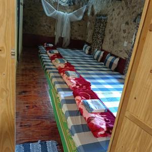 a room with a bed with cars on it at Quang Thuận Bản Giốc Homestay in Cao Bằng +272 photos