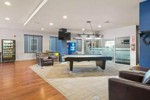 a living room with a pool table in it at Private 2Bdrm Apartment Convenient to All in Greeley
