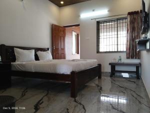 Island Dreams Resort客房内的一张或多张床位