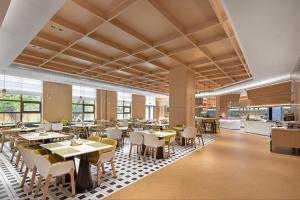 Veitingastaður eða matsölustaður á Home2 Suite by Hilton Chengdu Pengzhou
