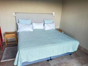 En eller flere senge i et værelse på Beachfront home