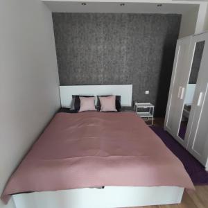Postel nebo postele na pokoji v ubytování BOBANO Apartman