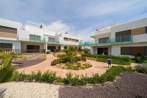 an external view of a building with a courtyard at Valerie in Orihuela