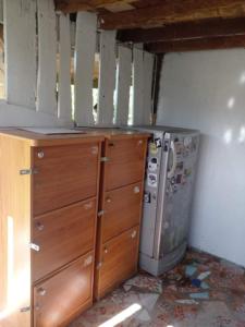 a kitchen with a chest of drawers and a refrigerator at Farmer house on Beverley hill Pai in Pai +17 photos