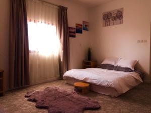 Postel nebo postele na pokoji v ubytování 411Motel