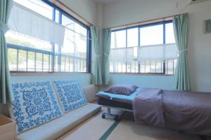 Katil atau katil-katil dalam bilik di 民宿たかはま Takahama Guest house