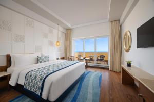 Postel nebo postele na pokoji v ubytování Fortune Beachfront, Puri - Member ITC Hotels' Group