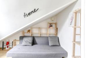 Postel nebo postele na pokoji v ubytování Studio Home Blanc - Au coeur de Vincennes