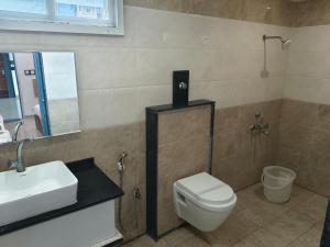 Koupelna v ubytování Hotel M S Pride
