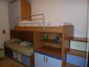 Двуетажно легло или двуетажни легла в стая в Casa Scalo Grande