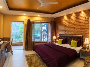 Voodi või voodid majutusasutuse Nirvana Mussoorie toas