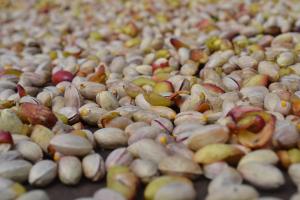 a pile of nuts sitting on a table at Good Morning Etna in Bronte