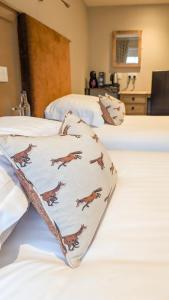 Voodi või voodid majutusasutuse The Mallard Hotel toas