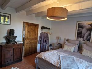 Łóżko lub łóżka w pokoju w obiekcie Maison Cassin47