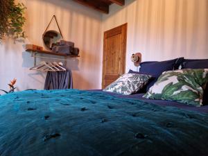 Łóżko lub łóżka w pokoju w obiekcie Maison Cassin47
