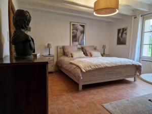 Łóżko lub łóżka w pokoju w obiekcie Maison Cassin47