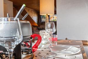 Nápoje v ubytování Joli appartement ambiance chalet à Crans-Montana + 29 fotografií
