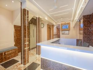 Postel nebo postele na pokoji v ubytování Hotel Al Madina palace