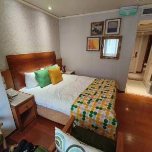 Voodi või voodid majutusasutuse Erin Hotel toas