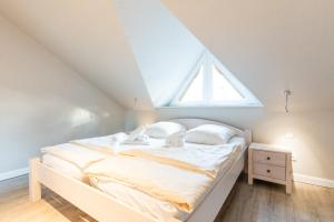 Ένα ή περισσότερα κρεβάτια σε δωμάτιο στο Alte Schule 5 +40 φωτογραφίες