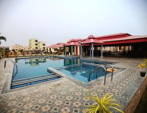 Bazén v ubytování Samudra Bilas Resort, Mandarmoni nebo v jeho okolí