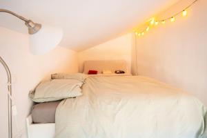 Postel nebo postele na pokoji v ubytování Studio mezzanine à 20 min de Strasbourg