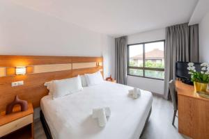 Postel nebo postele na pokoji v ubytování Hotel Faranda Los Tilos, Ascend Hotel Collection