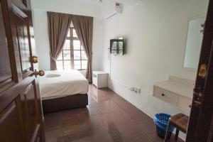Postel nebo postele na pokoji v ubytování B Link Hotel