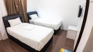 B Link Hotel客房内的一张或多张床位