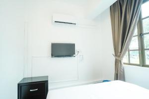 TV a/nebo společenská místnost v ubytování B Link Hotel + 18 fotografií