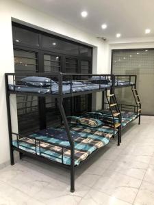 Palanda nebo palandy na pokoji v ubytování Biệt Thự Trường Hải