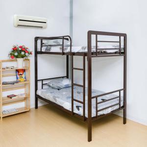 Postel nebo postele na pokoji v ubytování Biệt Thự Trường Hải